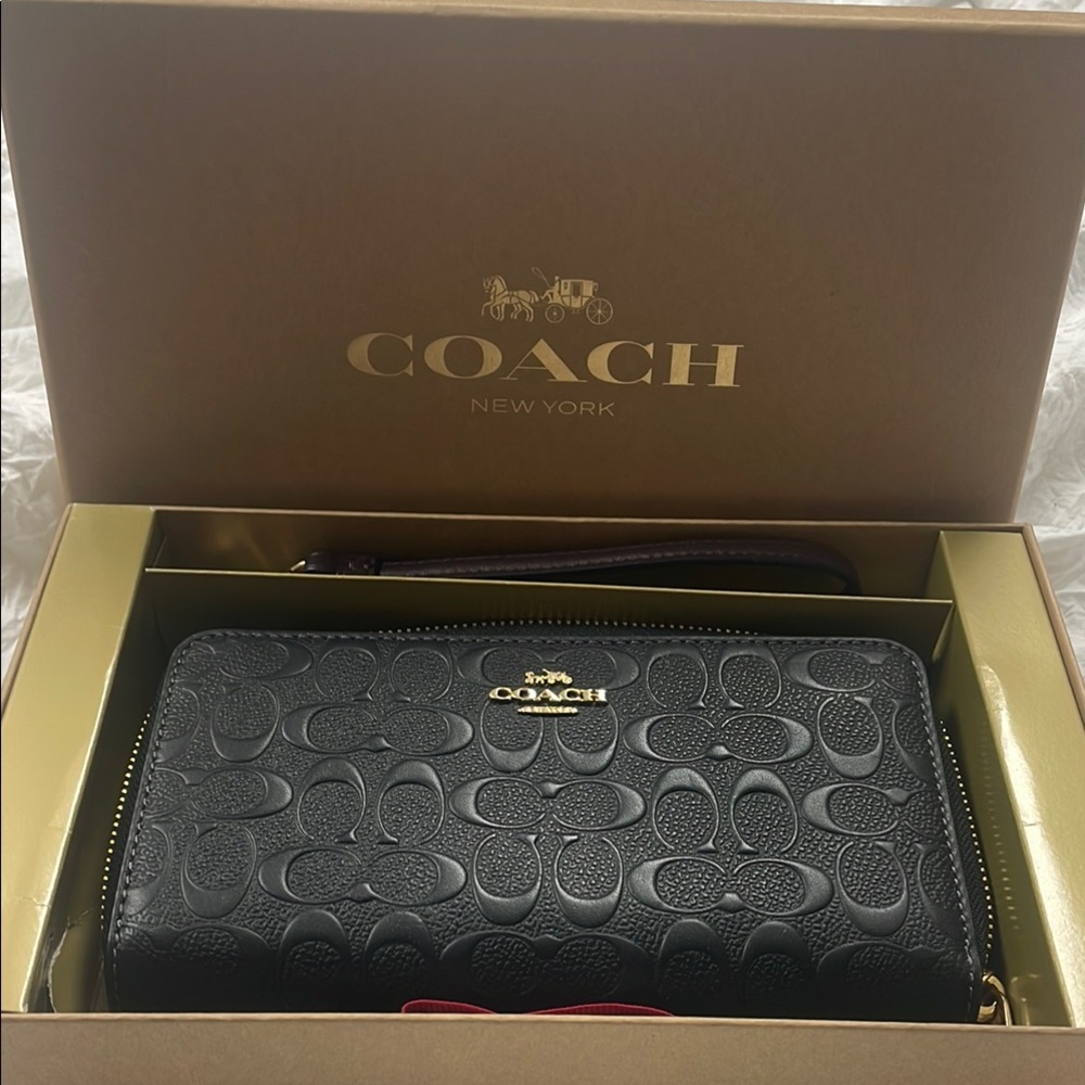 Coach Black Leather Wallet with Signature Embossed Design